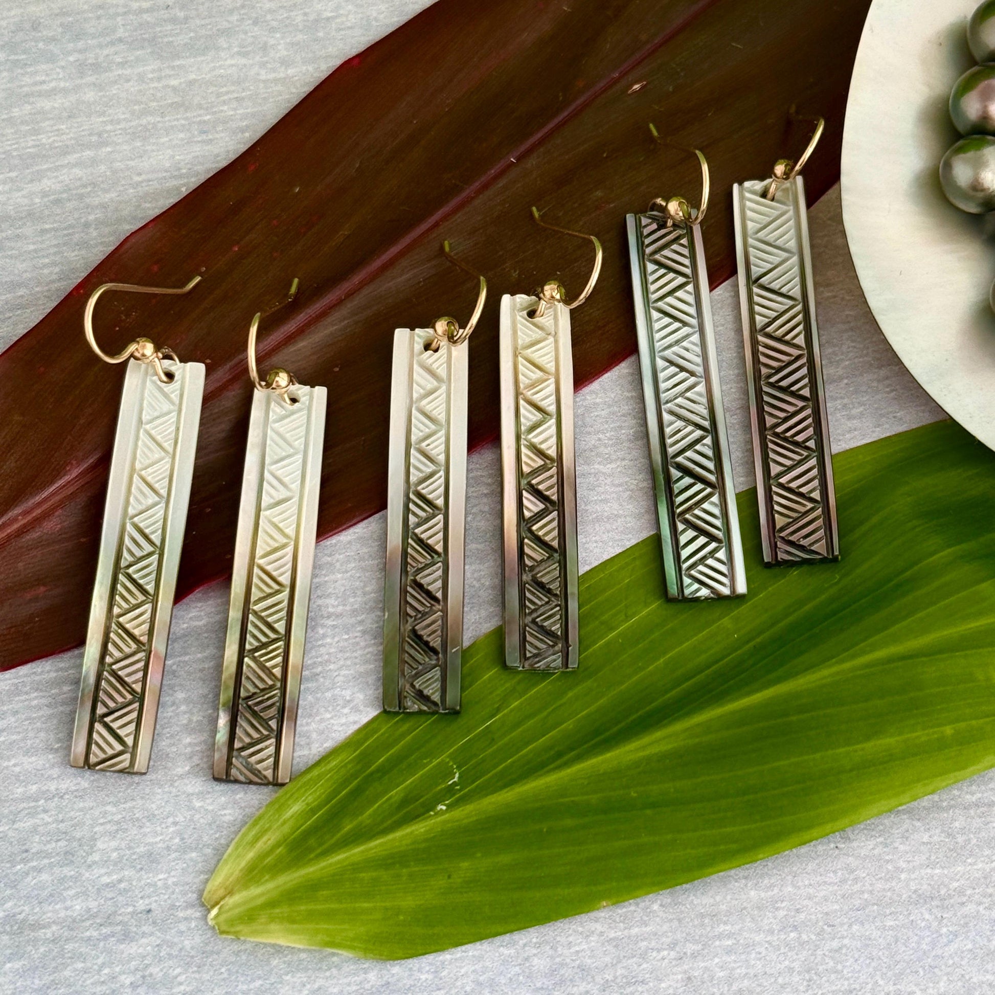 Mother of pearl earrings Made in Hawaii with Traditional Lauhala design with deep Hawaiian meanings handmade ocean jewelry with seashell