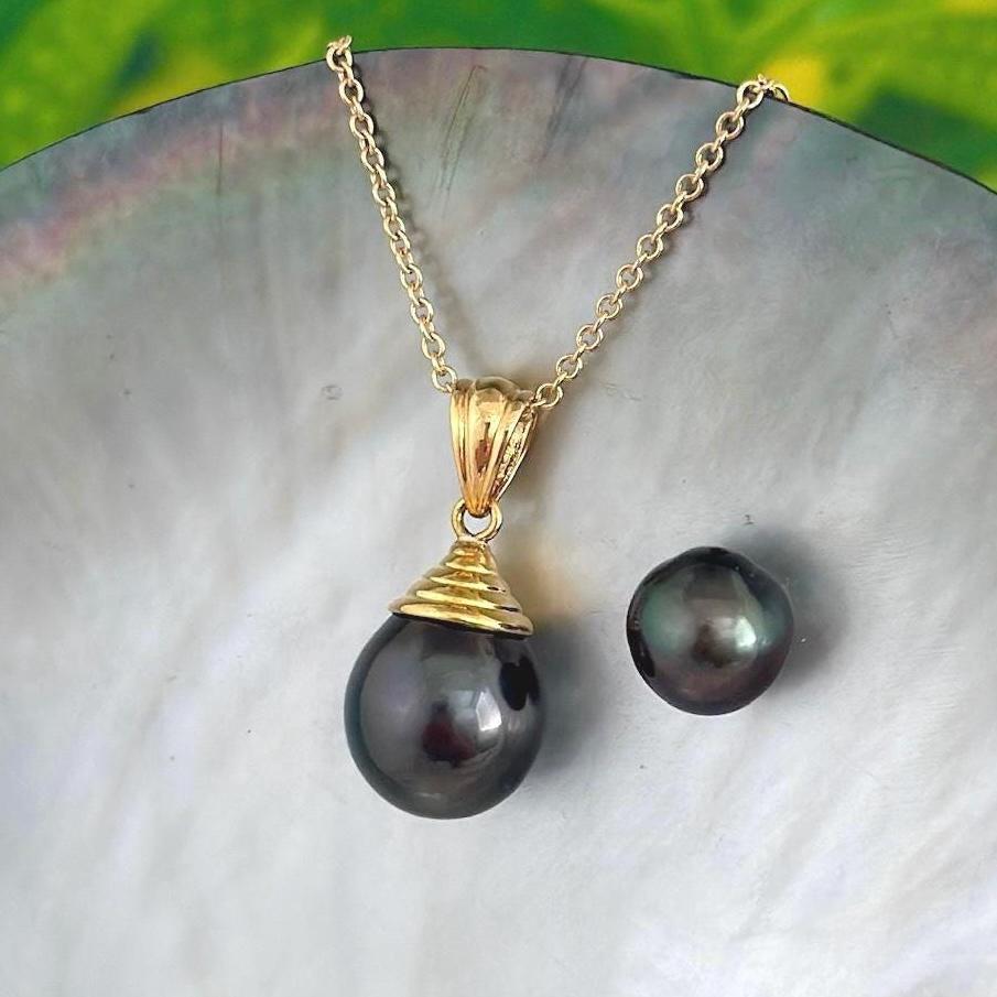 exceptional large 12.6mm tahitian black pearl pendant set on a sculpted solid gold bail