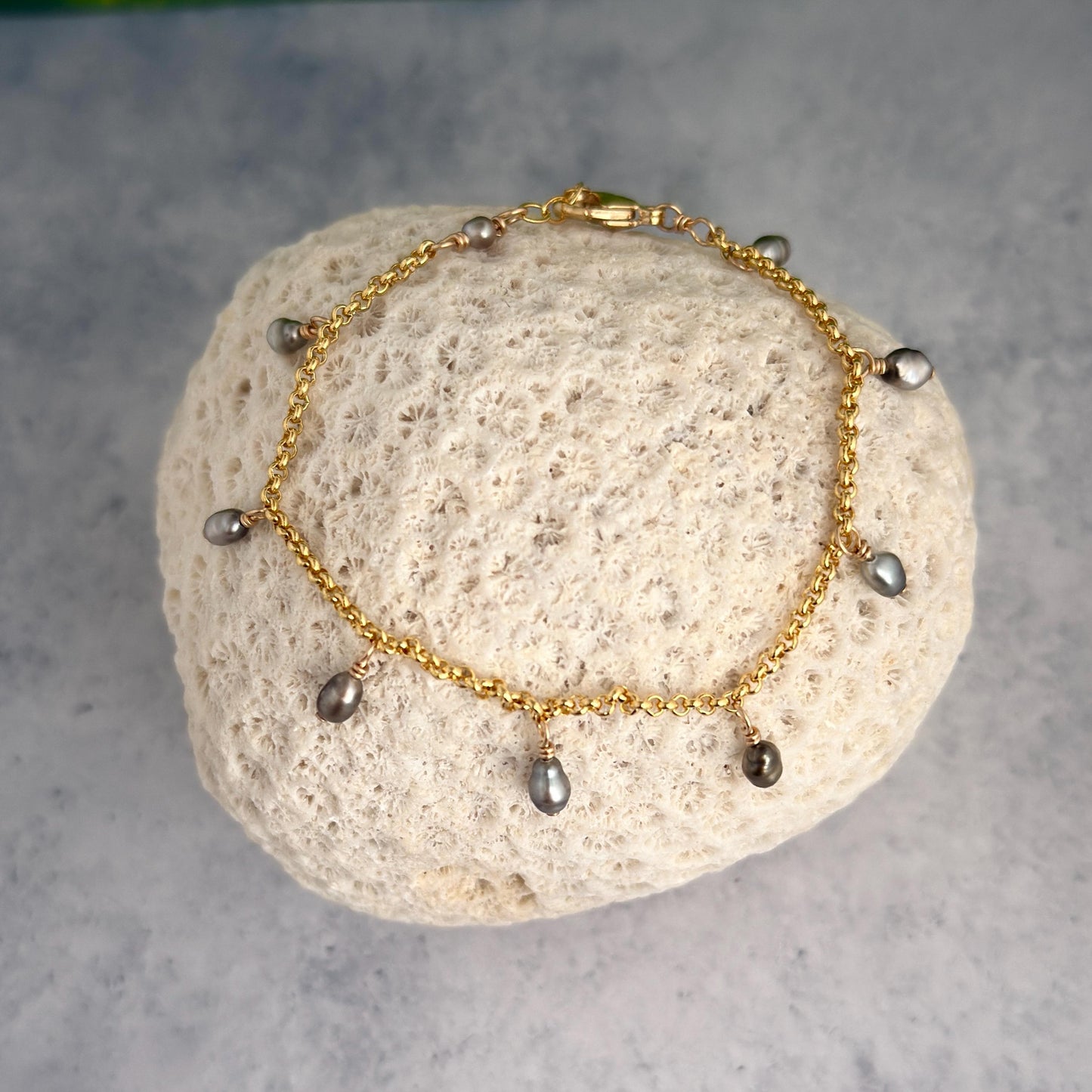 tahitian pearl bracelet with organic keshi and gold filled chain, in a charm style