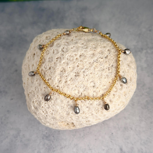 tahitian pearl bracelet with organic keshi and gold filled chain, in a charm style