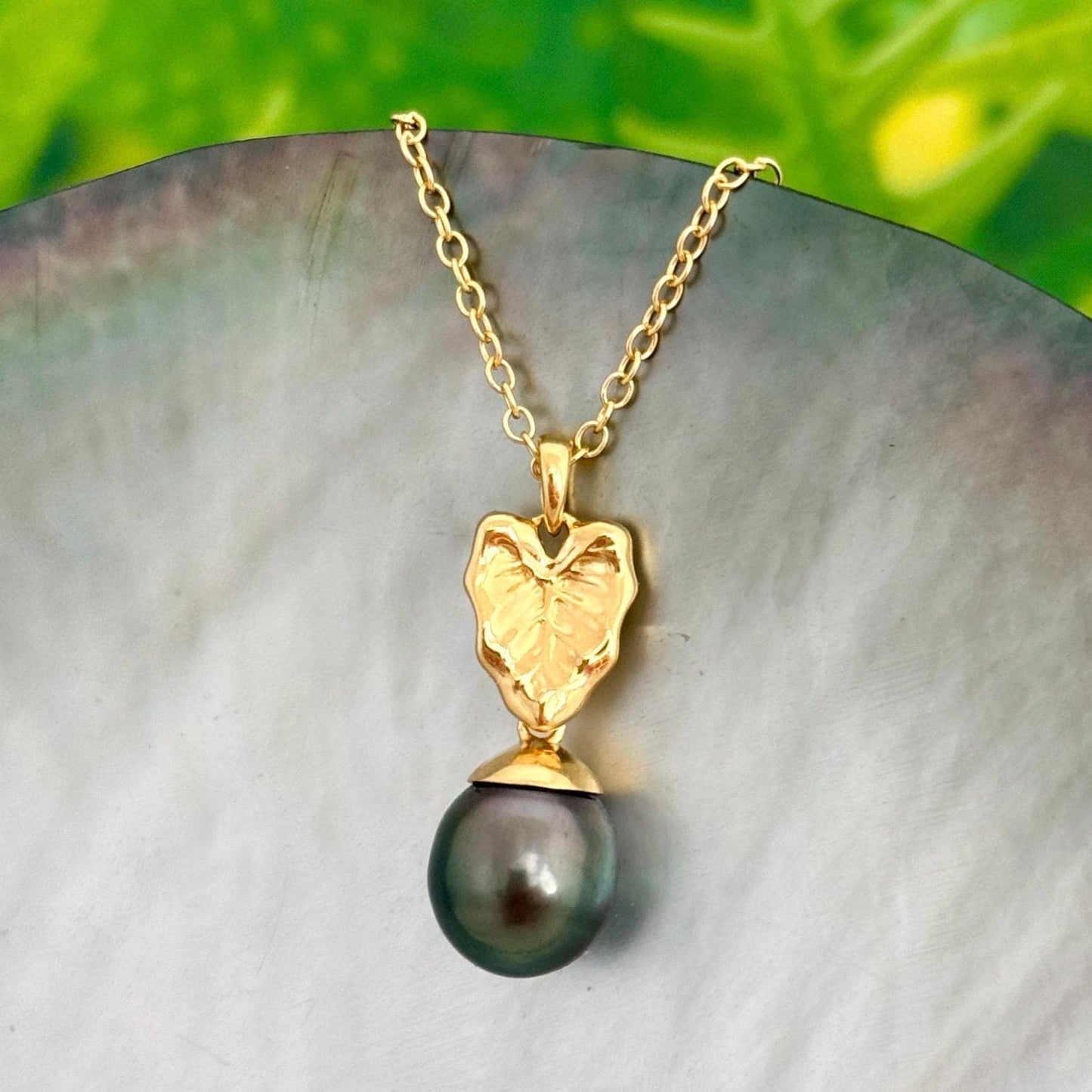 Tahitian pearl pendant set in 14k yellow goldvermeil with a Hawaiian Kalo leaf design