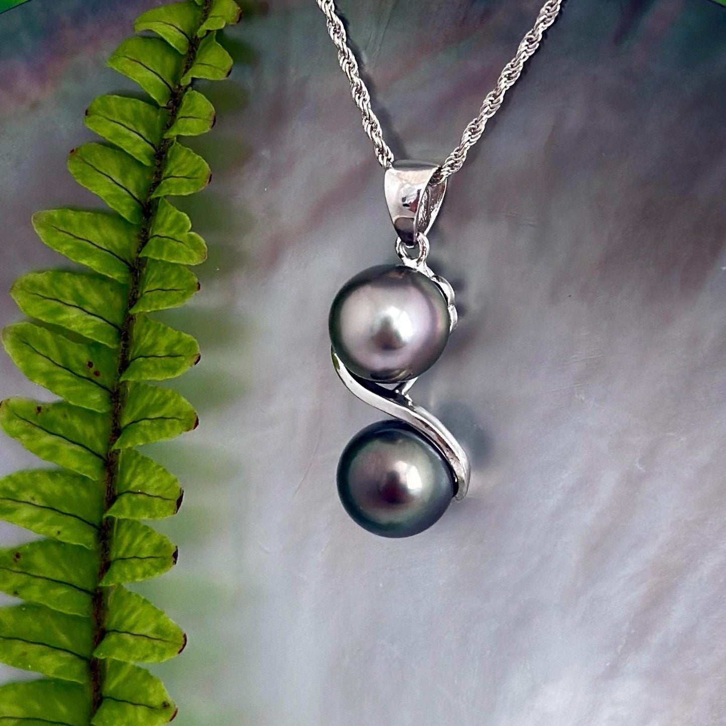 Tahitian pearl pendant with two near round pearls pastel pink and green color, in sterling silver