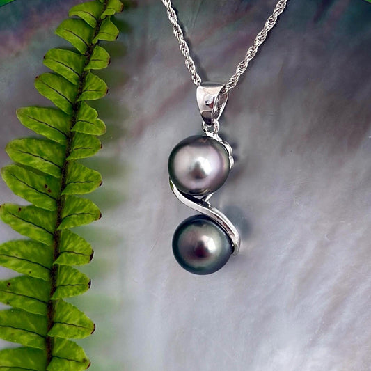 Tahitian pearl pendant with two near round pearls pastel pink and green color, in sterling silver