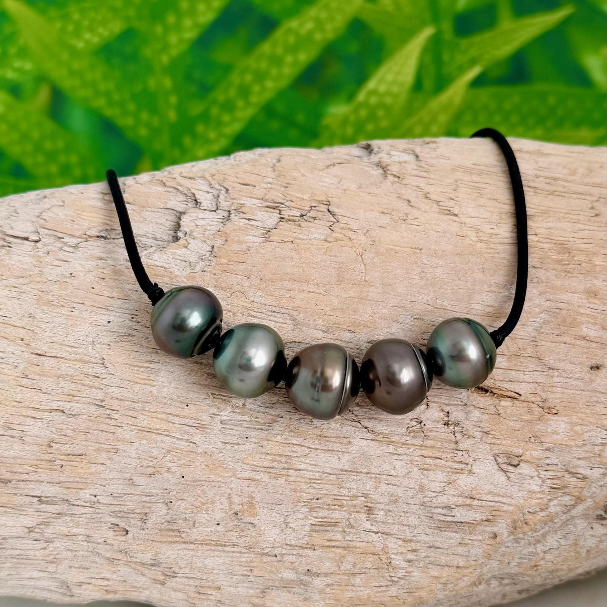 tahitian pearl leather necklace with black cord and big pearls