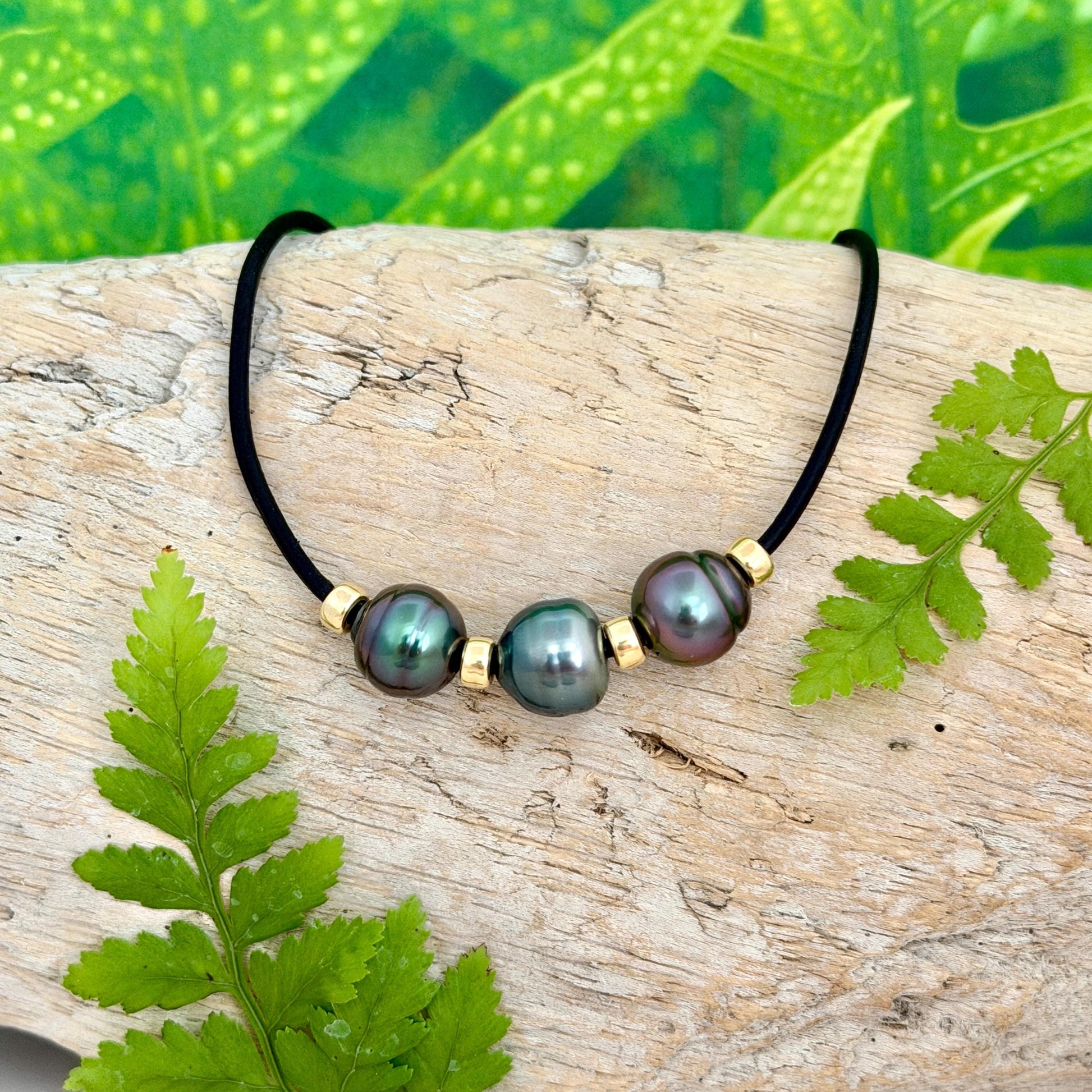 black leather necklace with three Multicolor Tahitian pearls and gold beads
