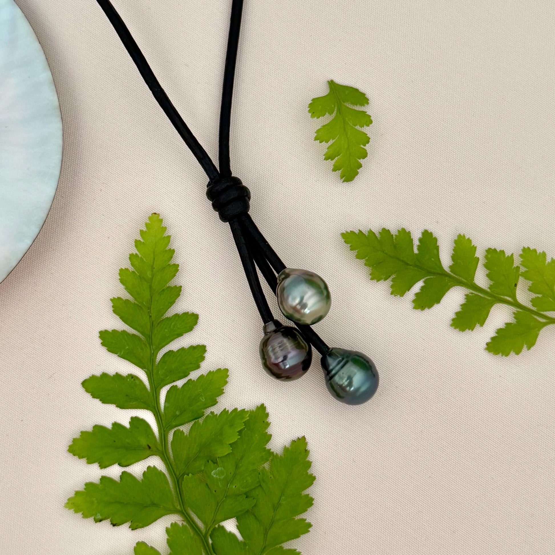 Tahitian Pearl Cluster Necklace: Leather Cord • Golden Peacock Pink Blue