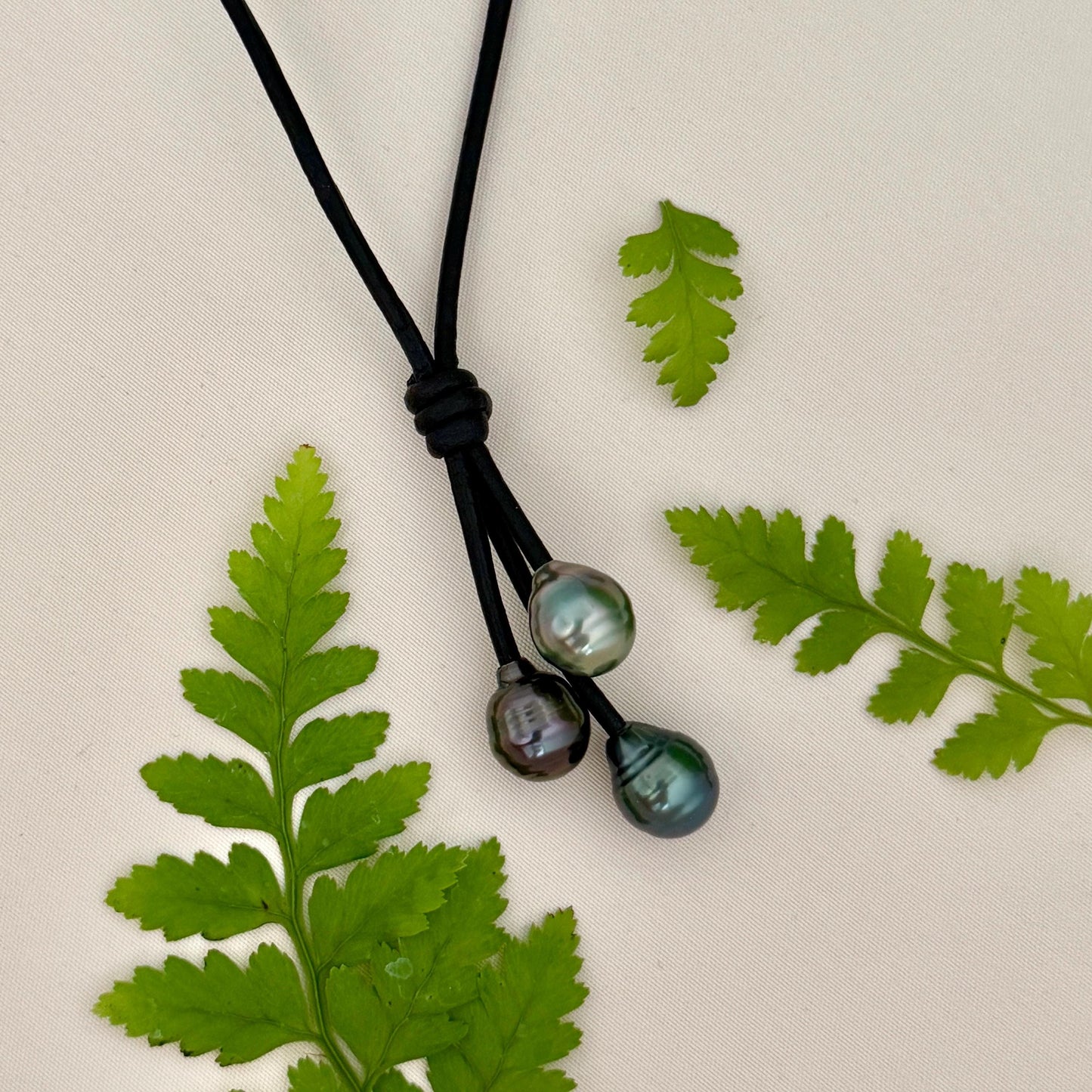Tahitian Pearl Cluster Necklace: Leather Cord • Golden Peacock Pink Blue