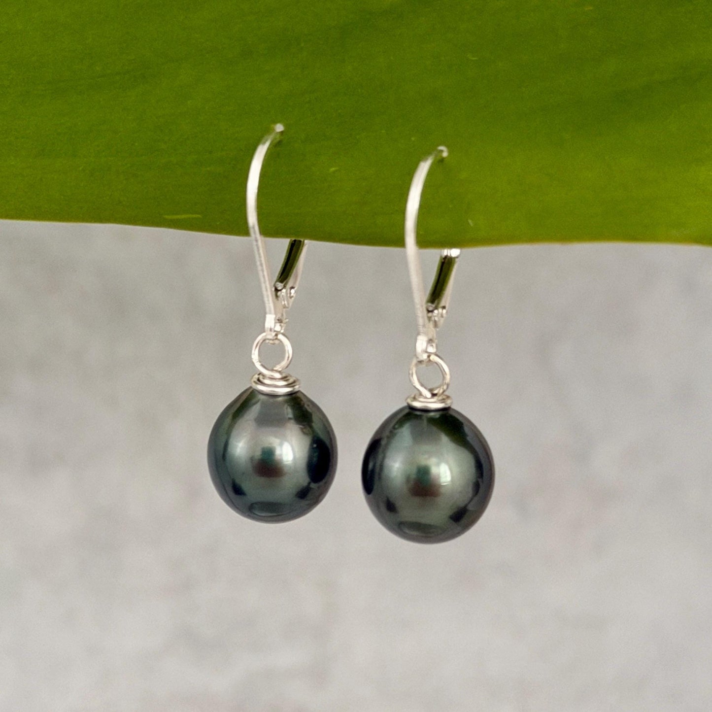 Sterling silver leverback earrings with Tahitian pearl with green color
