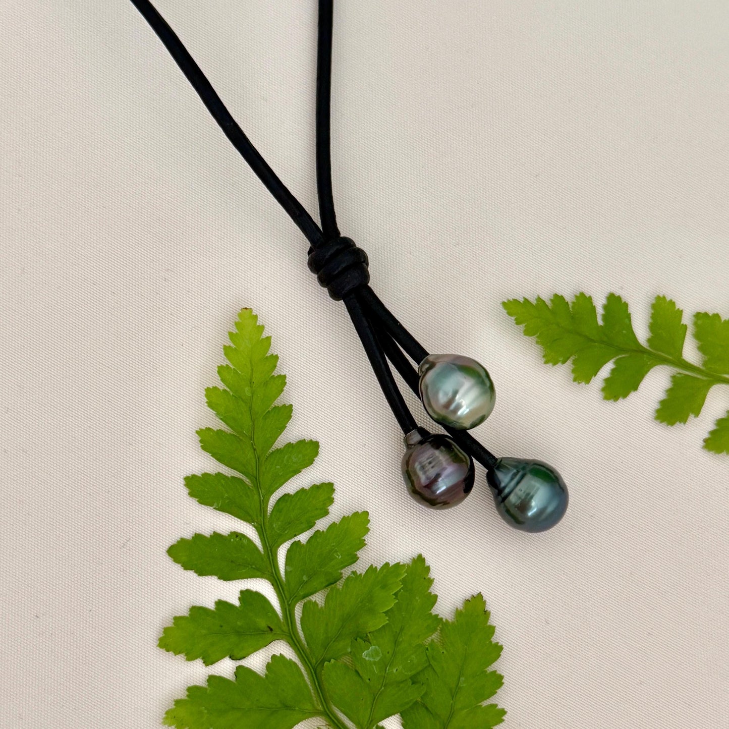 Tahitian Pearl Cluster Necklace: Leather Cord • Golden Peacock Pink Blue