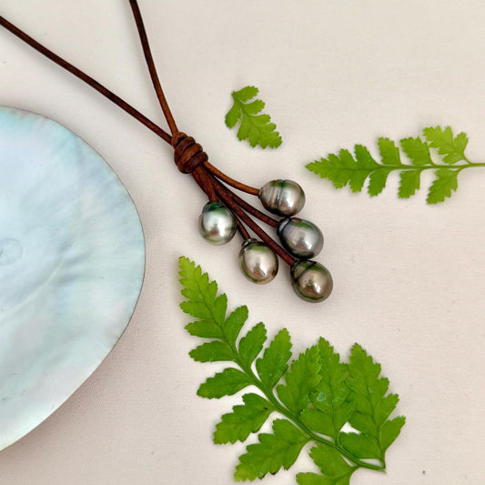 Brown leather necklace with five Natural Tahitian Chocolate pearls.