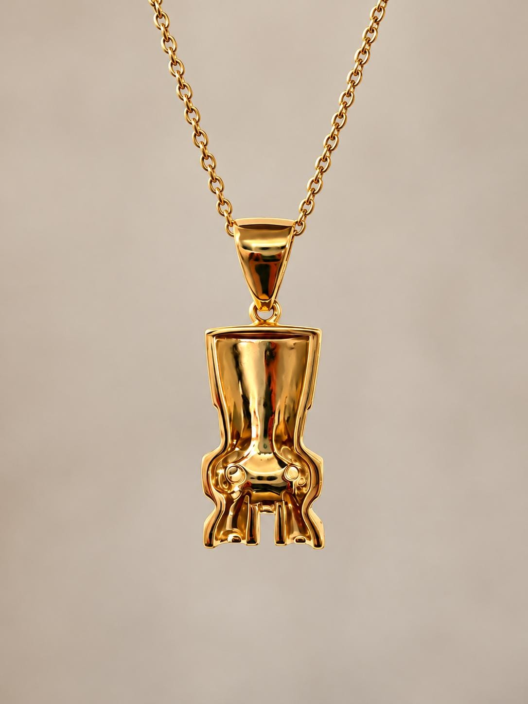 Tahitian pearl necklace with Gold Tiki • Dark Green gem
