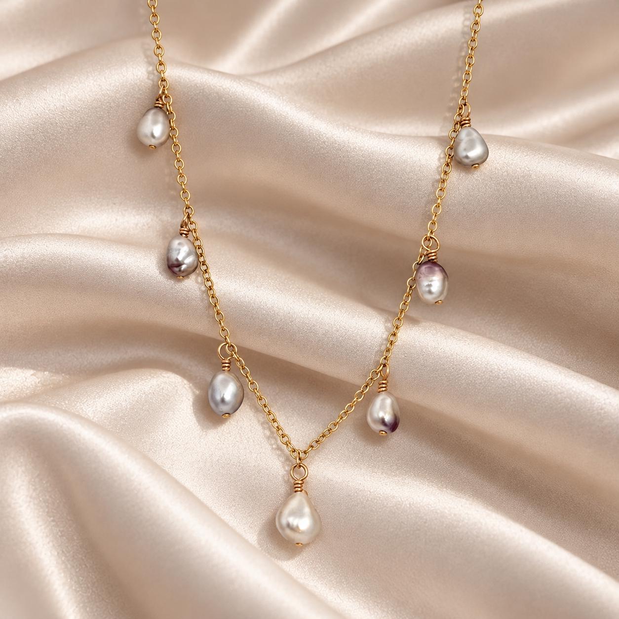 Tahitian Keshi Pearl necklace • 7 Light gems in 14k Gold filled