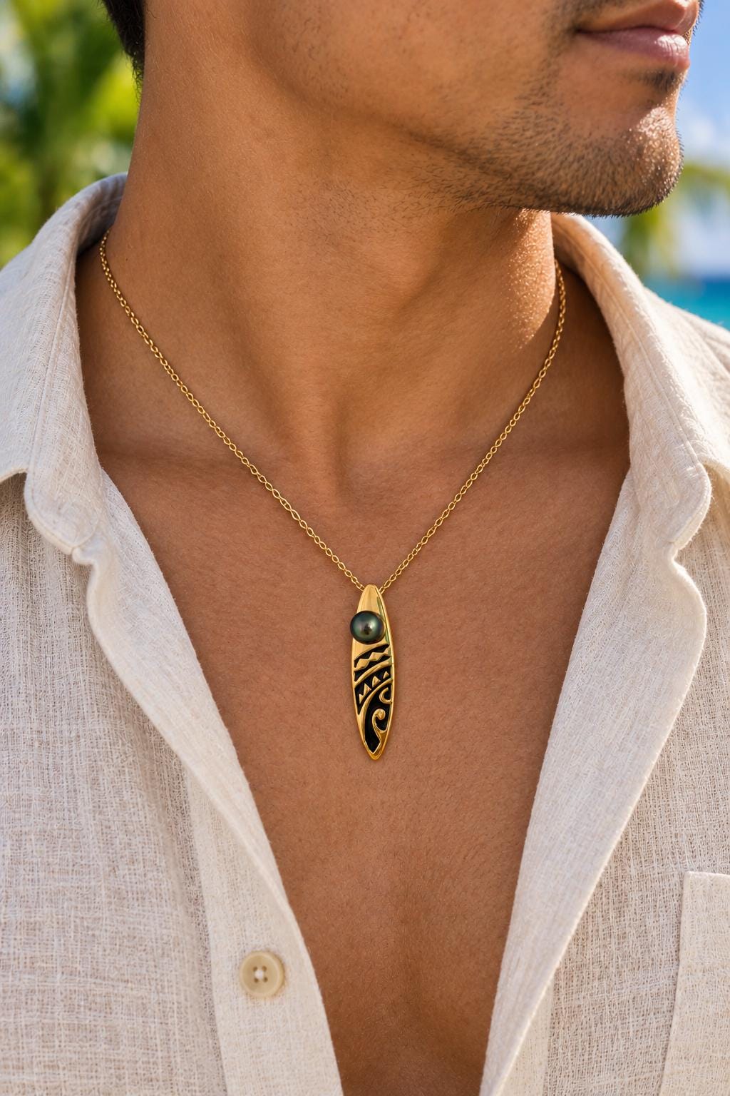 Tahitian pearl necklace with Gold surfboard • Dark Green gem
